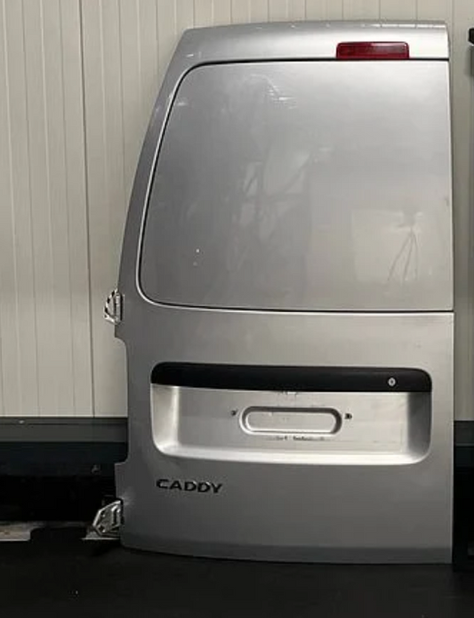 VW Caddy Tur hinten links silber
